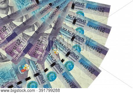 100 Philippine Piso Bills Lies Isolated On White Background With Copy Space Stacked In Fan Shape Clo