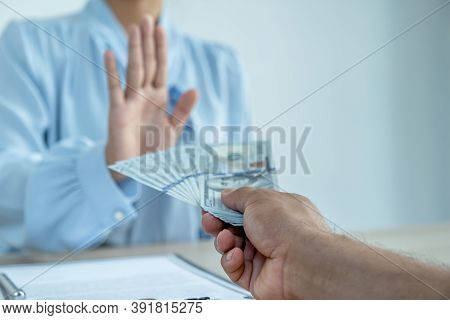 Government Officials Refused To Accept Bribes From The Businessmen Offer For Signing In A Contract O