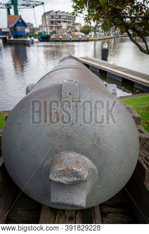 Vintage Heavy Gun At The City Gate Zijlpoort And  The Canal, Landmark In The, Leiden, Netherlands