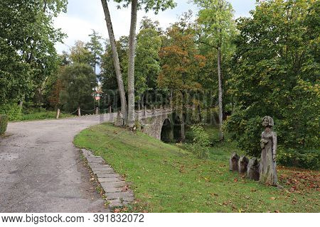 Very Old Stone Bridge In The Park Next To The Manor In The Latvian Kazdanga In October 2020
