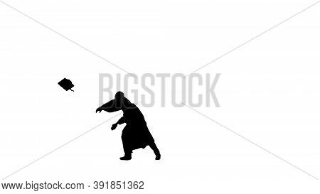 Silhouette Male Graduate Throwing His Mortarboard Looking At Cam