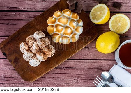 Mini Chocolate And Lemon Pie Cake With Cup Of Tea.