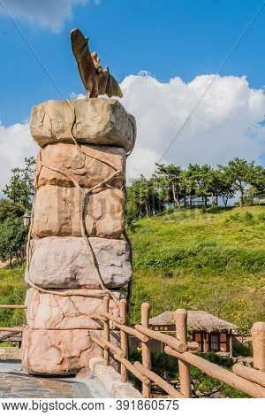Hampyeong-gun, South Korea; September 27, 2020:statue Of Giant Bat On Top Of Boulders On Roof Of Bat