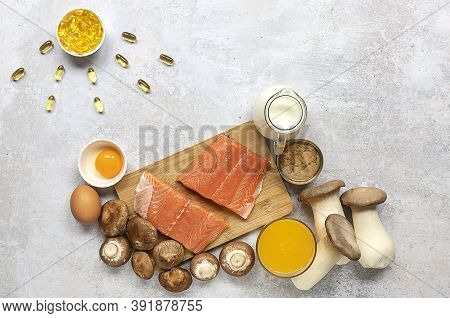 Flat Lay Composition With Products Rich In Vitamin D. Canned Tuna, Mushrooms, Salmon, Eggs, Milk, An