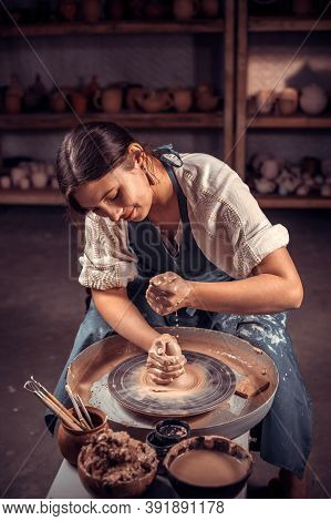 Charming Ceramist Making Ceramic Pot On The Pottery Wheel . Concept For Woman In Freelance, Business