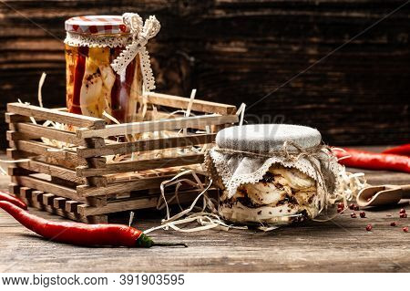 Iraqi Traditional Cheese Made From Buffalo Milk. Cheese In Marinade With Olive Oil, Chili And Basil,
