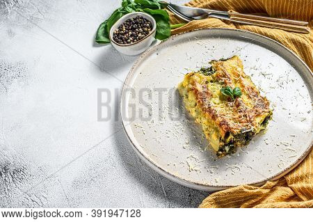 Cannelloni With Ricotta And Spinach. Italian Cuisine. Gray Background. Top View. Copy Space