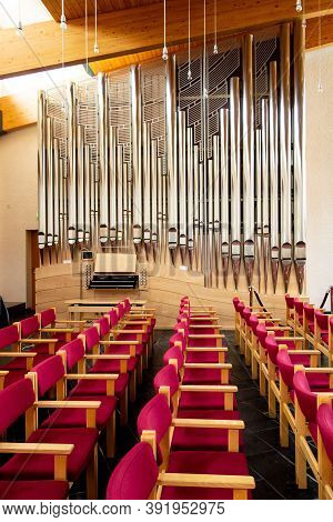 Stykkisholmur, Iceland - July 9, 2014: Organ And Row Of Seats In Stykkisholmskirkja Church In Stykki