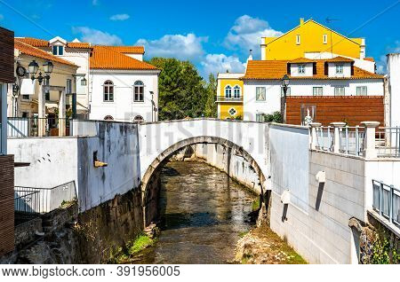 Arch Bridge Across The Alcobaca River In Alcobaca, Portugal