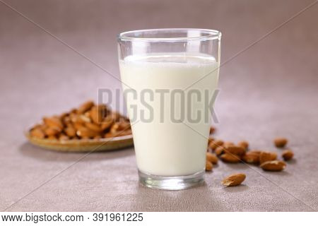 almond mik in glass and ingredient