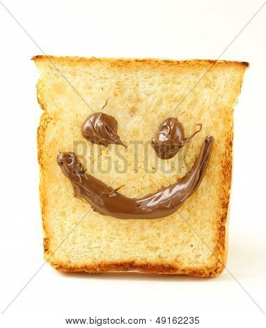 funny toast bread with chocolate smile on white background