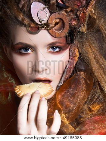 Stylish lady with cake