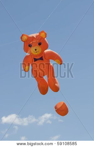 Orange Bear Kite Flys High