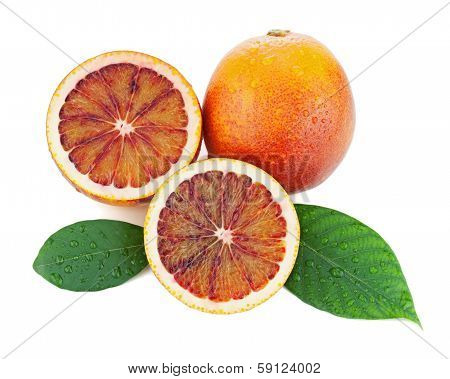 Blood Oranges With Cut And Green Leaves Isolated On White Background.
