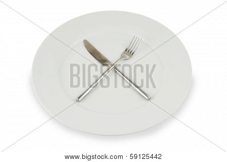 Plate With Knife And Fork On White