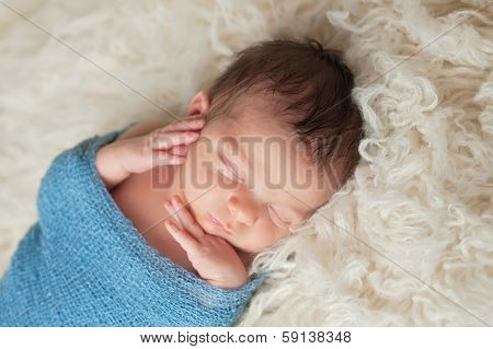 Portrait Of A Sleeping Newborn Baby Boy