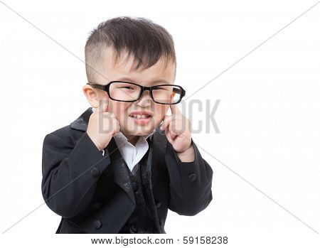 Baby boy finger pointing to his eye