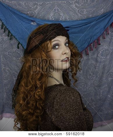 Beautifiul young woman dressed as a gypsy