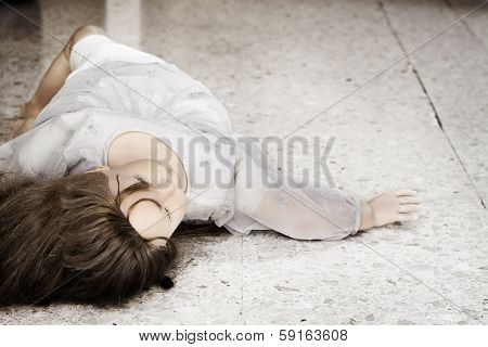 Abandoned Doll Thrown On The Floor