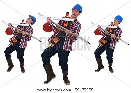 Handyman struggling to carry tools