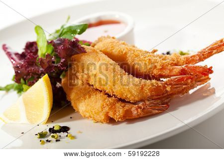Deep Fried Shrimps with Fresh Salad Leaves and Spicy Sauce