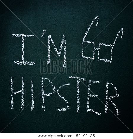 sentence I am hipster written with chalk in a chalkboard