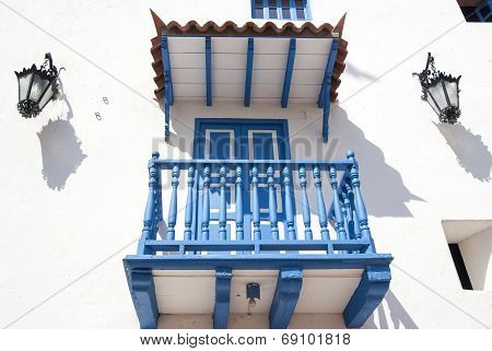 White blue balcony with lamps