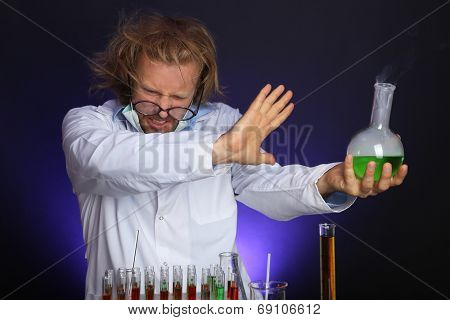 Crazy scientist working in laboratory