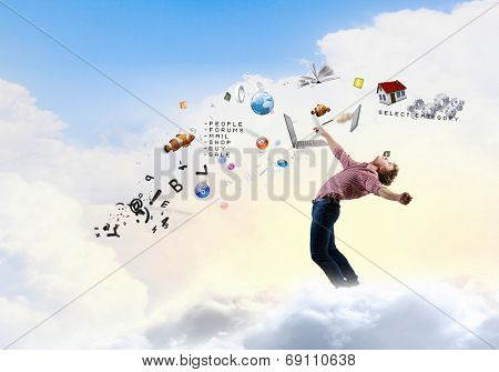 Young man in casual evading from flying icons