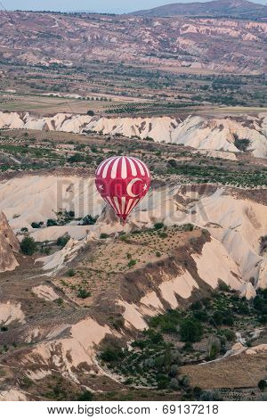 Hot Air Baloon over Cappadocia at sunrise. Turkey