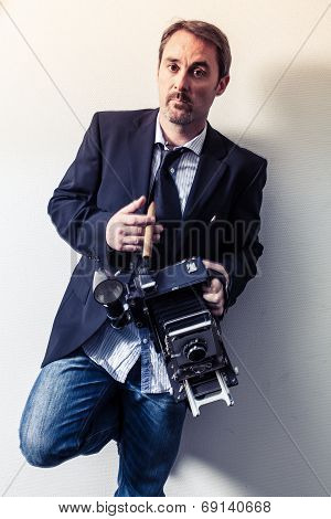 Photographer With Vintage Camera
