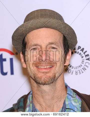 LOS ANGELES - MAR 28:  Denis O'Hare arrives to the Paleyfest 2014: American Horror Story COVEN  on March 28, 2014 in Hollywood, CA                