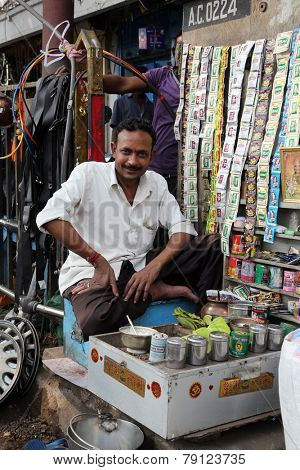 KOLKATA, INDIA - FEBRUARY 08: Streets of Kolkata. Making Paan in Kolkata. Areca nut and spices wrapped in a betel leaf which is chewed and then spat out, February 08, 2014.
