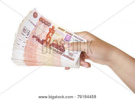 Stack of five thousandth bills in the female hand.