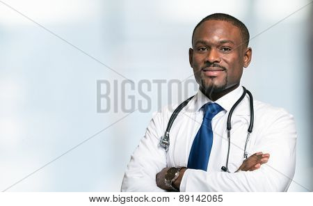 Portrait of an handsome smiling doctor