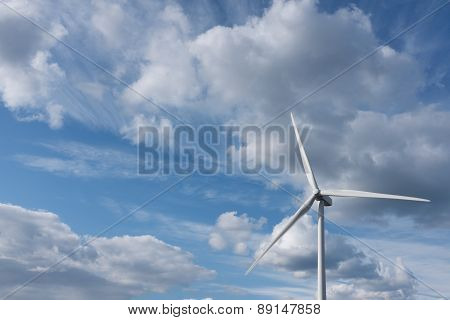 Wind Turbine Against Dramatic Cloudy Sky