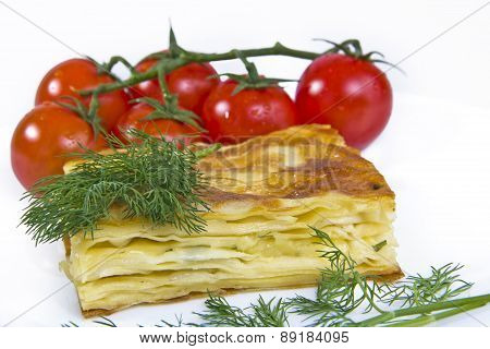 Turkish cheese pie borek with tomatoes isolated on white background
