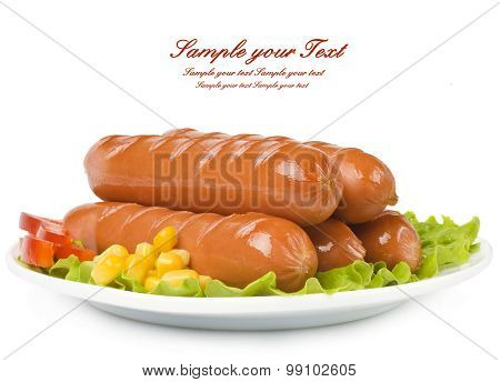 Close up of sausage and fresh vegetables