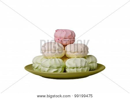 Green, Pink, Marshmallow Cream Folded Into A Pyramid In The Gree