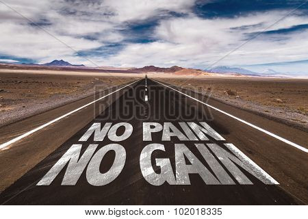 No Pain No Gain written on desert road