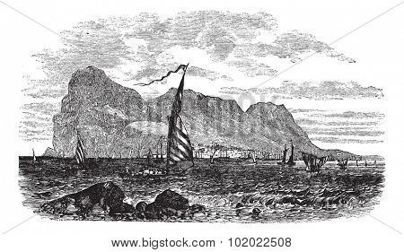 Gibraltar in Iberian Peninsula, Europe, during the 1890s, vintage engraving. Old engraved illustration of Gibraltar with moving boats in front. Trousset encyclopedia (1886 - 1891).