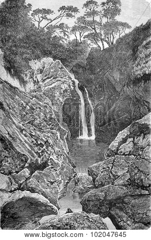 Waterfall near Maghera, vintage engraved illustration. Le Tour du Monde, Travel Journal, (1865).