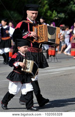 Musicians With The Traditional Costume Of Sardinia.