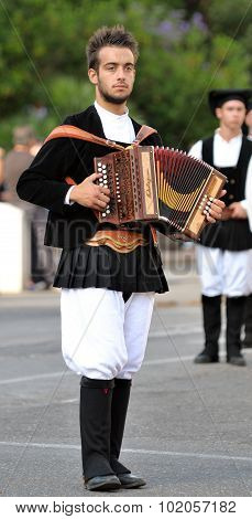 Musicians With The Traditional Costume Of Sardinia.
