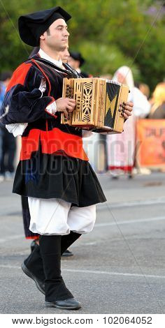 Musicians With The Traditional Costume Of Sardinia.