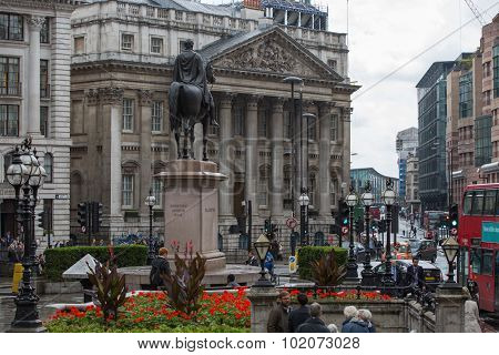 LONDON, UK - SEPTEMBER 17, 2015: City of London. Bank of England square view after the rain with lot