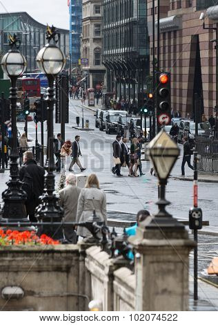 LONDON, UK - SEPTEMBER 17, 2015: City of London. Bank of England square view after the rain with lot