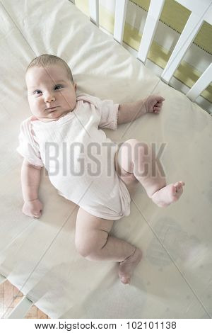 Baby In A Baby Bed