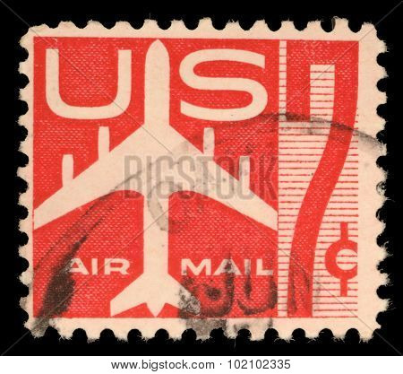 USA - CIRCA 1960: United States postage stamp in the value of 7c used for overseas air mail deliveries showing air mail symbols and the print Air Mail, circa 1960