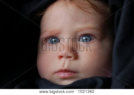 Baby Wrapped In Black
